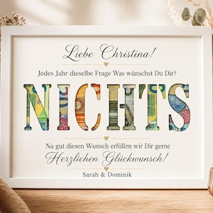 May include: A white framed print featuring the German text 'Liebe Christina! Jedes Jahr dieselbe Frage Was w&uuml;nschst Du Dir? NICHTS Na gut diesen Wunsch erf&uuml;llen wir Dir gerne Herzlichen Gl&uuml;ckwunsch! Sarah & Dominik' with the word NICHTS filled with euro banknotes.