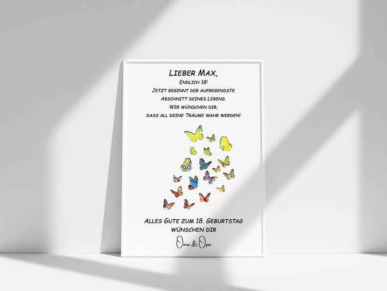 May include: A white card with a message wishing someone a happy 18th birthday. The card features a colorful butterfly design and the text "Lieber Max, Endlich 18! Jetzt beginnt der aufregendste Abschnitt deines Lebens. Wir w&uuml;nschen dir, dass all deine Tr&auml;ume wahr werden! Alles Gute zum 18. Geburtstag w&uuml;nschen dir Oma & Opa".