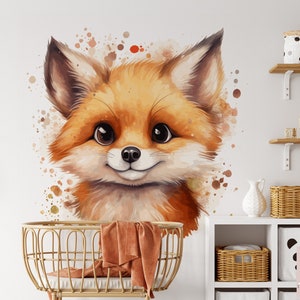 May include: A watercolor illustration of a cute orange fox with brown ears and a white muzzle. The fox is surrounded by watercolor splatters in shades of brown and orange.