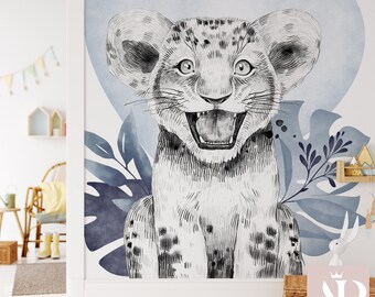 May include: A black and white illustration of a lion cub with its mouth open, set against a blue watercolor background with leafy foliage.