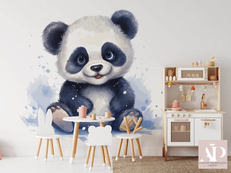 May include: A watercolor illustration of a cute panda bear sitting on a white background. The panda is wearing a black and white fur coat and has a big smile on its face. The illustration is surrounded by blue watercolor splatters.