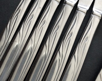 Stainless steel flatware set for 6. Vintage MCM cutlery