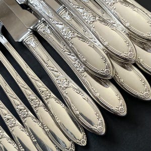 Vintage silver plated 7 piece 8 place settings flatware set from 1881 Rogers, Chateau / Virginian design. 56 pc