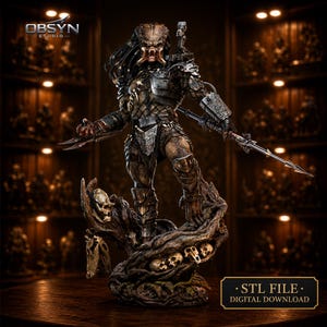 May include: A detailed statue of the Predator, a science fiction character, standing on a base of skulls and twisted wood. The figure is clad in armor and holds bladed weapons. The image includes the text "STL FILE - DIGITAL DOWNLOAD".