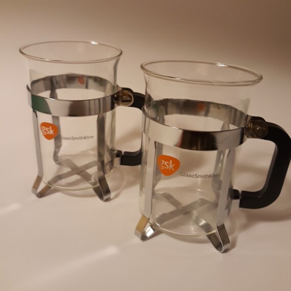 Vintage Arcosteel Set of Two Glass and Chrome Coffee Tea Mugs.  Contemporary, Coffee-shop Styling. Plastic Handles. Bodum Mug Look Alike. -   Hong Kong