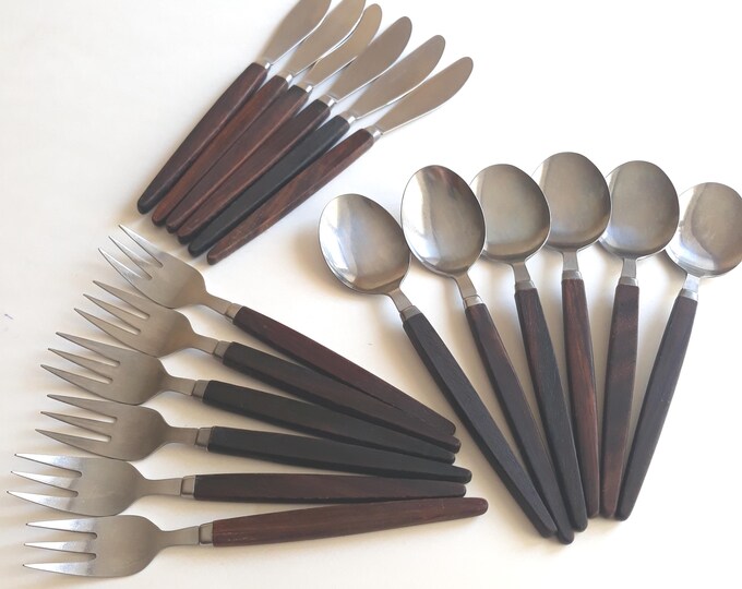 Rostfritt Stal Sweden Mid-century Modern Swedish Flatware. Teak, Stainless Steel. Scandinavian Design from the 1960s.