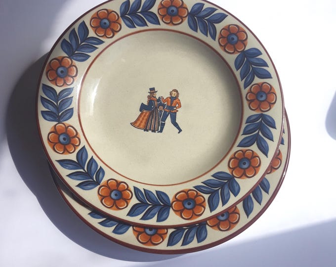 One "Höganäs gille" Höganäs Sweden Stoneware Vintage Dinner Plate. Motif from Bonad painting done in 1814 by Johannes Nilsson Halland.
