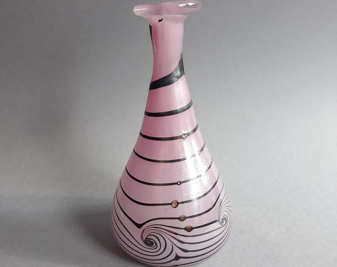 Beautiful Hand Blown Pink Iridescent Vase with Black Swirls and Small Decorative Dots Holes. Lovely Shape. Quite Heavy. Sleek Design.