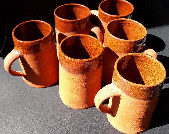 Set of 2 Frederikssund Vikingerne Denmark Bier Mugs. Red Earthenware. The Inside is Glazed, Exterior Matte with with Glazed Top. Marked.