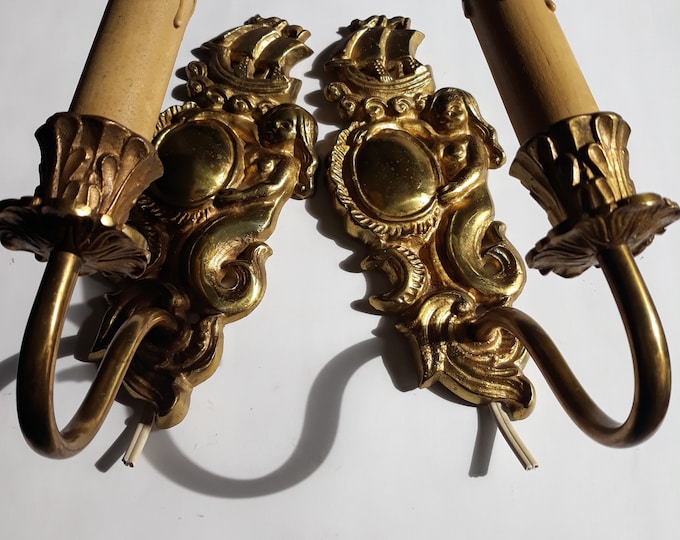 2 Vintage Brass Wall Sconces Wall Lights from Sweden dedicated to the Theme of the Sea. It depicts a Ship and a Mermaid with a Mirror.