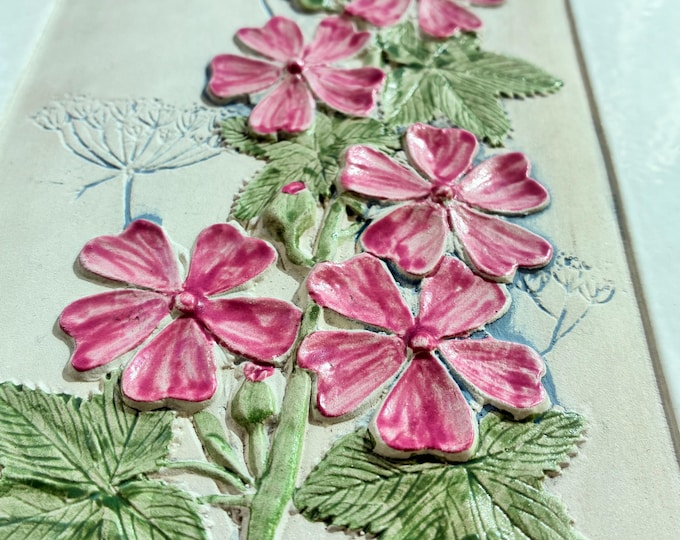 One Jie Gantofta Sweden Ceramic Wall Hanging, Plaque. Design Aimo. White Glazed Rim, Ivory Matt base, Glazed Pink Mallow Flower Relief.