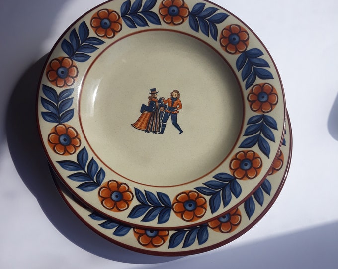 One "Höganäs gille" Höganäs Sweden Stoneware Vintage Dinner Plate. Motif from Bonad painting done in 1814 by Johannes Nilsson Halland.
