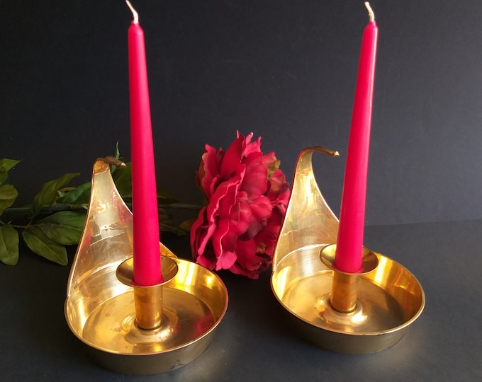 A Pair of  Mid-Century Modern Solid Brass Candlesticks with Handles. Vintage Home Decorations from Sweden. Especially Nice for Christmas.