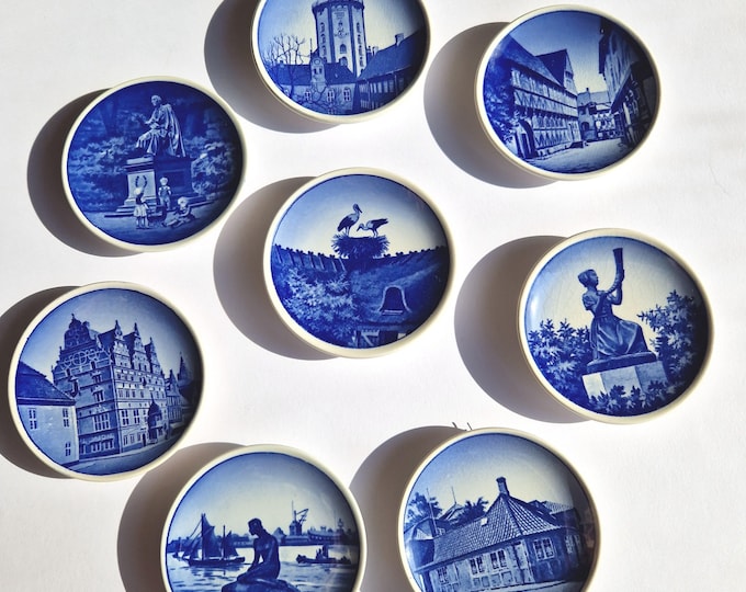Set of 8 Vintage Royal Copenhagen Miniature Wall Plates in Blue, White. Plates decorated with Scenes of Danish Landmarks and Heritage Sites.
