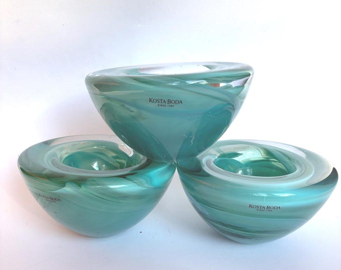 Atoll Kosta Boda Sweden Light Green Tea Light Holder. Designed by Anna Ehrner. Made in Sweden. Heavy Glass. Swirl Design.