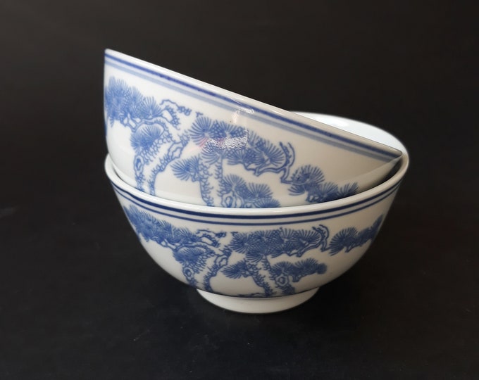 Two Gorgeous Oriental Chinese Bowls. White base with Depicted Blue Old Threes On One Side. Simple and Elegant Design. Marked. Made in China.