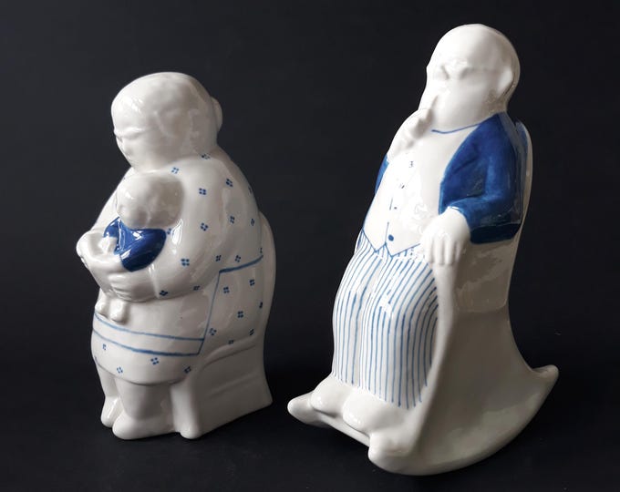 Set of 2 Gustavsberg Sweden Figurines from ‘Fanny and Grandpa’ Series by Sven Lundqvist. Grandpa smokes Pipe. Grandmother with Grandchild.