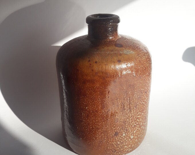 Ceramic Studio Vase in Squarish Shape with Round Bottom. Beautiful Brown Semi Glazed Vase. Laconic, Clean Shape Design. Comes from Sweden.