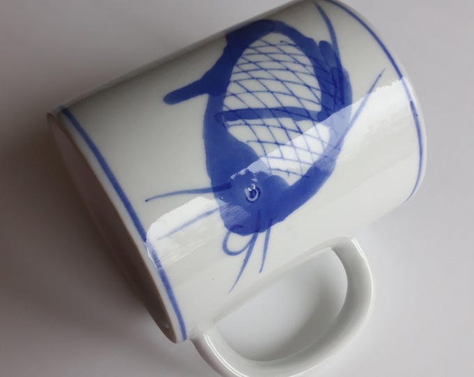 Adorable Hand Painted Vintage Chinese Porcelain Mug with a Blue Koi Karp Fish Decoration on the Sides. Marked. Good Vintage Condition.