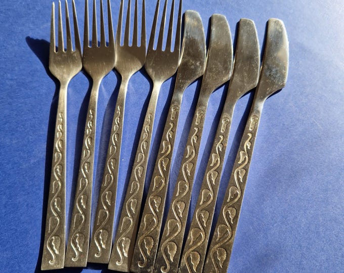 Set of 8 Soviet Era Flatware Pieces. Beautiful Pattern on the Handles. Stainless Steel. Marked.