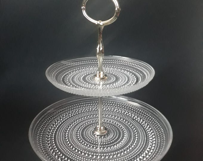 Iittala Kastehelmi Nuutajarvi Arabia. Design by Oiva Toikka. Two tier serving Dish. Glass Cake Stand. Bun Stand. Silver Colour Metal Handle