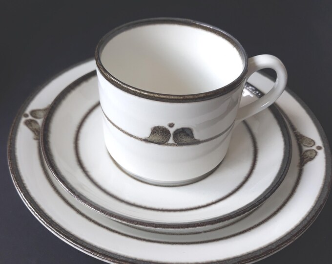 Rorstrand Sweden Trio in Pattern Nordica. Designed by Carl-Harry Stålhane. Cup, Saucer and Cake Plate. White Glaze with Brown Decor.