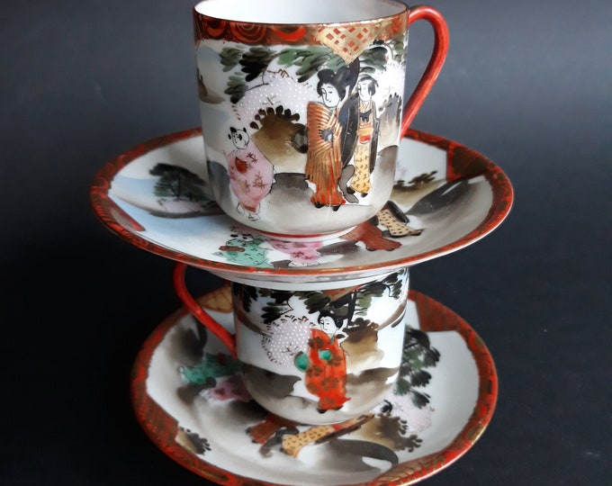 A Pair of Vintage Japanese Eggshell Porcelain Teacups Saucers. Beautiful Hand painted Colourful Design. Gold Accents. Geishas and Landscape.
