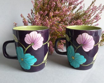 Pair of Vintage Indiska  Rosemarje Ceramic Coffee Tee Mugs. Flower Design. Turquoise, Purple Flowers on a Black Background. Swedish Design.