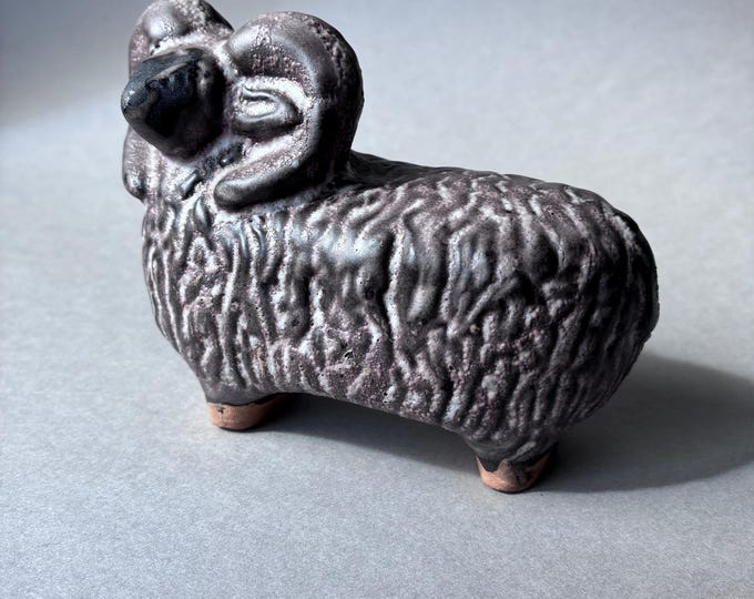 Szilasi Visby Sweden Ceramic Ram Figurine  featuring a robust Ram with large curled Horns. Colours of Earthy Tones. Marked.