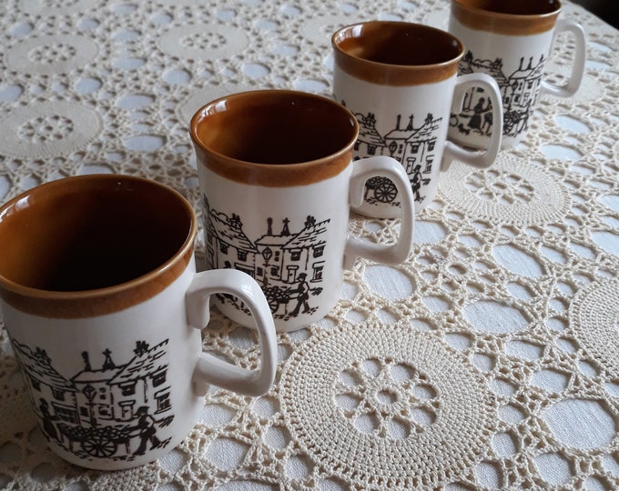 Pair of Vintage English Ironstone Tableware England Mugs with Handle. Dark Brown Old City Motive on Beige Base. The Decoration is Embossed.
