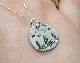 Woodland birds necklace in sterling silver | trees | birds | landscape | circle pendant | recycled silver necklaces | ravens | Black birds