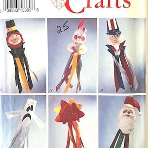 May include: Simplicity Crafts pattern featuring six whimsical windsock designs. Includes a witch, bunny, Uncle Sam, ghost, flower, and Santa Claus. Each design has colorful ribbons and festive details.