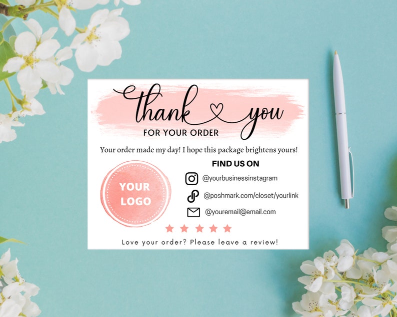 May include: Thank you card with a pink watercolor background and a handwritten thank you message. The card also includes a space for a logo, social media handles, and a review request.