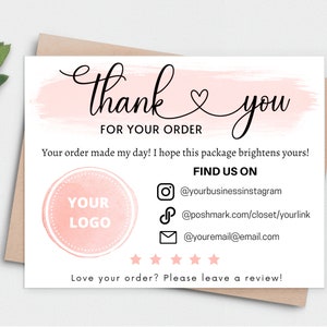 May include: Thank you card with a pink watercolor background and the text "Thank you" in cursive. The card also includes the text "For your order" and "Your order made my day! I hope this package brightens yours!"  The card also includes a logo placeholder, social media icons, and the text "Find us on".