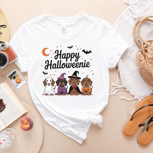 Happy Halloweenie Dog T-Shirt, Cute Dachshund Halloween Tee, Autumn Festive Apparel, Spooky Season Casual Wear