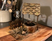 Vintage MCM copper metal tin wishing well music box