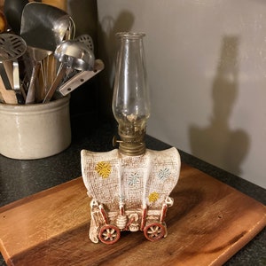 Vintage Chalkware ceramic chuck wagon oil lamp with hurricane