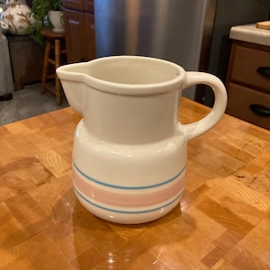 Vintage McCoy pottery milk/creamer pitcher blue and pink