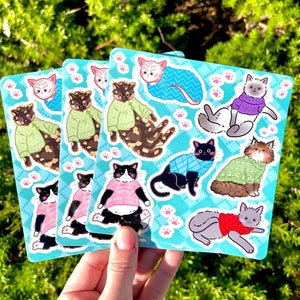 Chats en pulls Feuille d’autocollants Grincheux | Chat personne brillant résistant à l’eau |  Kitty noir smoking nu sphynx tortie siamois maine coon bleu