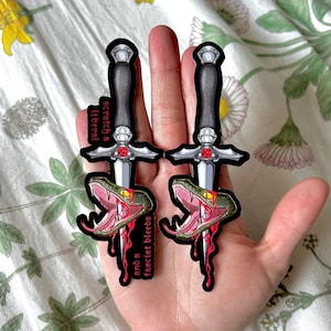 Adesivo de tatuagem de espada e cobra | Decalque de vinil brilhante original | arte política esquerdista Arranhe um liberal e um fascista sangra Pantera Negra X