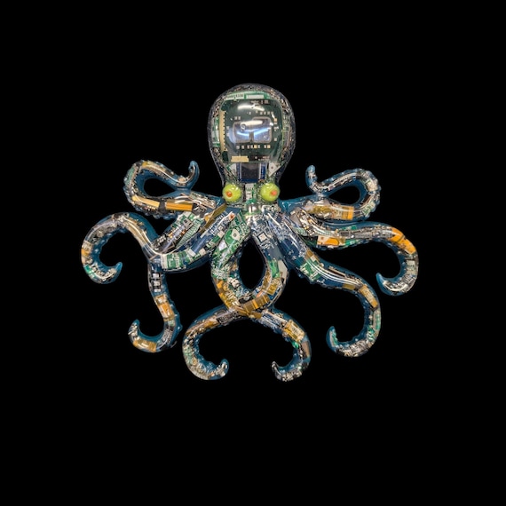 An octopus sculpture hand-built from real recycled circuit boards and motherboard scraps, with glow-in-the-dark resin — e-waste turned into genuine wall art that hits the intersection of tech and sea creature obsession perfectly.
