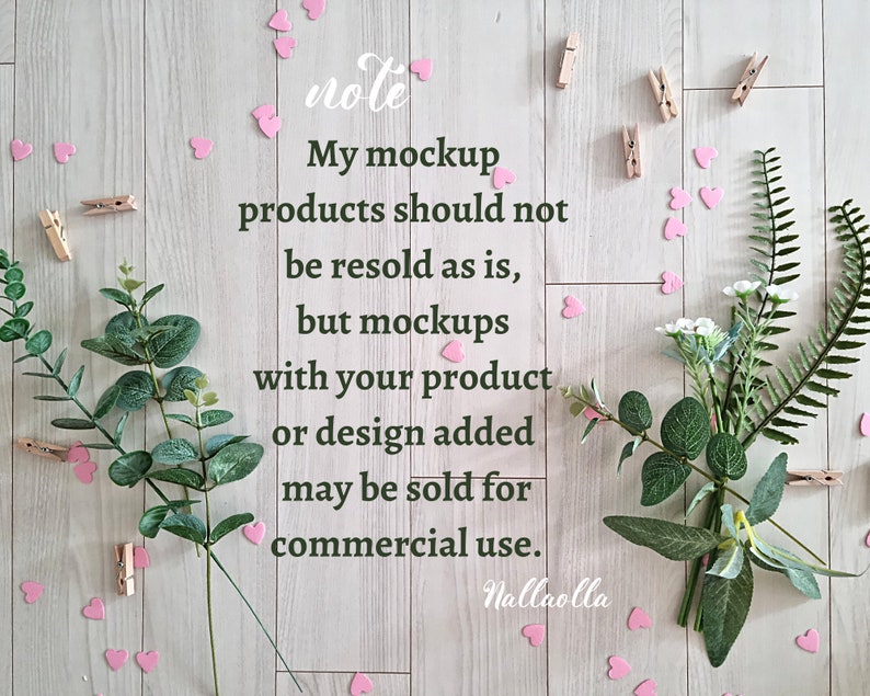 May include: A note on a wooden background with pink hearts, greenery, and clothespins. The note reads: "My mockup products should not be resold as is, but mockups with your product or design added may be sold for commercial use. Nallaolla"