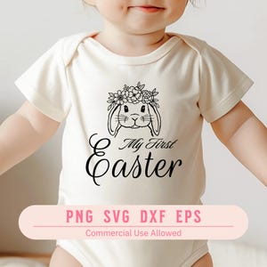 May include: A white onesie with a black and white illustration of a bunny wearing a flower crown. The text "My First Easter" is written below the bunny.