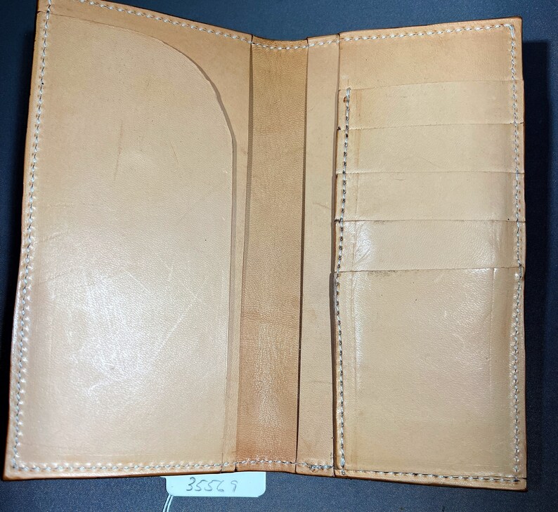 Interior -Medium brown roper style vertical wallet all 100 percent USA Herman Oak Leather.