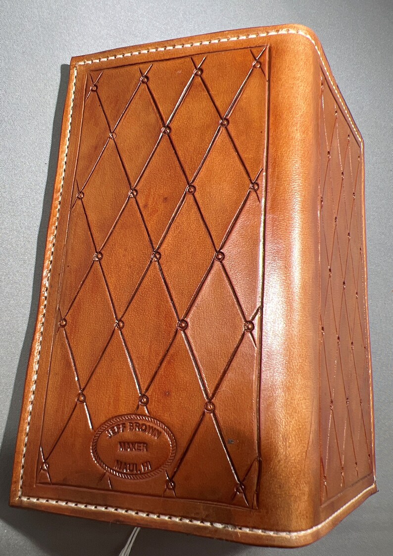 Backside. Medium brown roper style vertical wallet all 100 percent USA Herman Oak Leather.