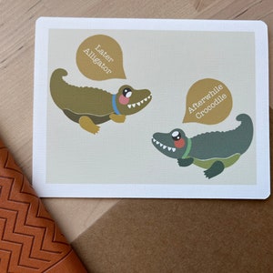 May include: A card with two cartoon alligators, one green and one brown, with speech bubbles that say "Later Alligator" and "Afterwhile Crocodile".