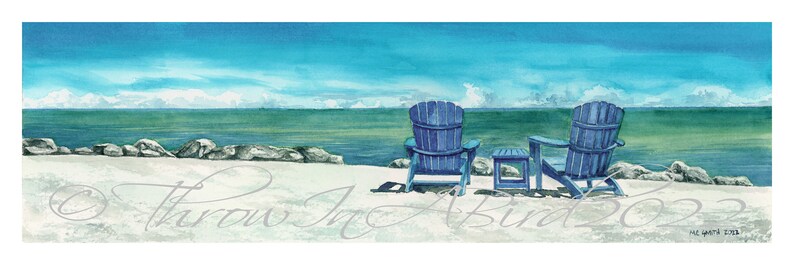 May include: Two blue wooden chairs facing the ocean on a white sandy beach. The chairs are on the shore with rocks and water in the background. The sky is blue with white clouds.