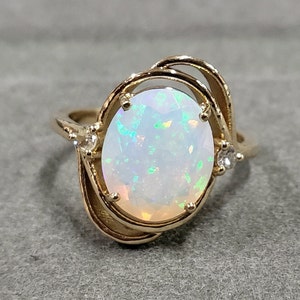 Handmade Ethiopian Opal and Diamond Ring: 14k Gold Prong Setting
