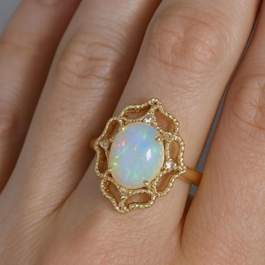 14k Gold Ethiopian Opal Ring with Diamonds: October Birthstone