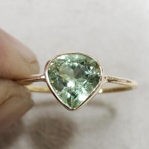 Handmade 18k gold aquamarine ring for girls, excellent green shade, dainty thin band design.
